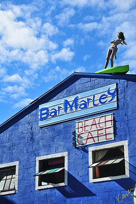 Photograph of  Bar Marley's Beach Cafe with surfing girl on roof, Knoxville, Tennessee